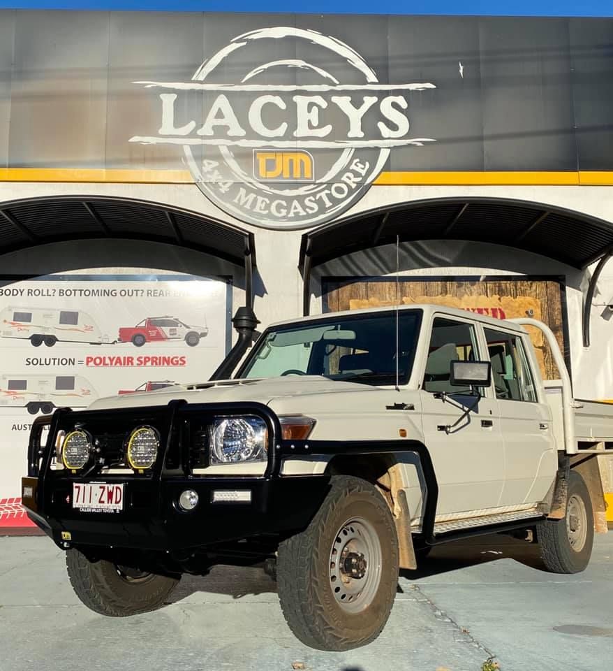 A White Truck is Parked in Front of a Lacey's Megastore — Lacey's TJM 4X4 Megastore in Rockhampton City, QLD