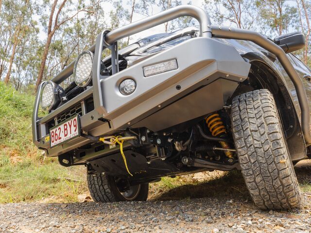 A Truck on the Side of a Dirt Road — Lacey's TJM 4X4 Megastore in Rockhampton City, QLD