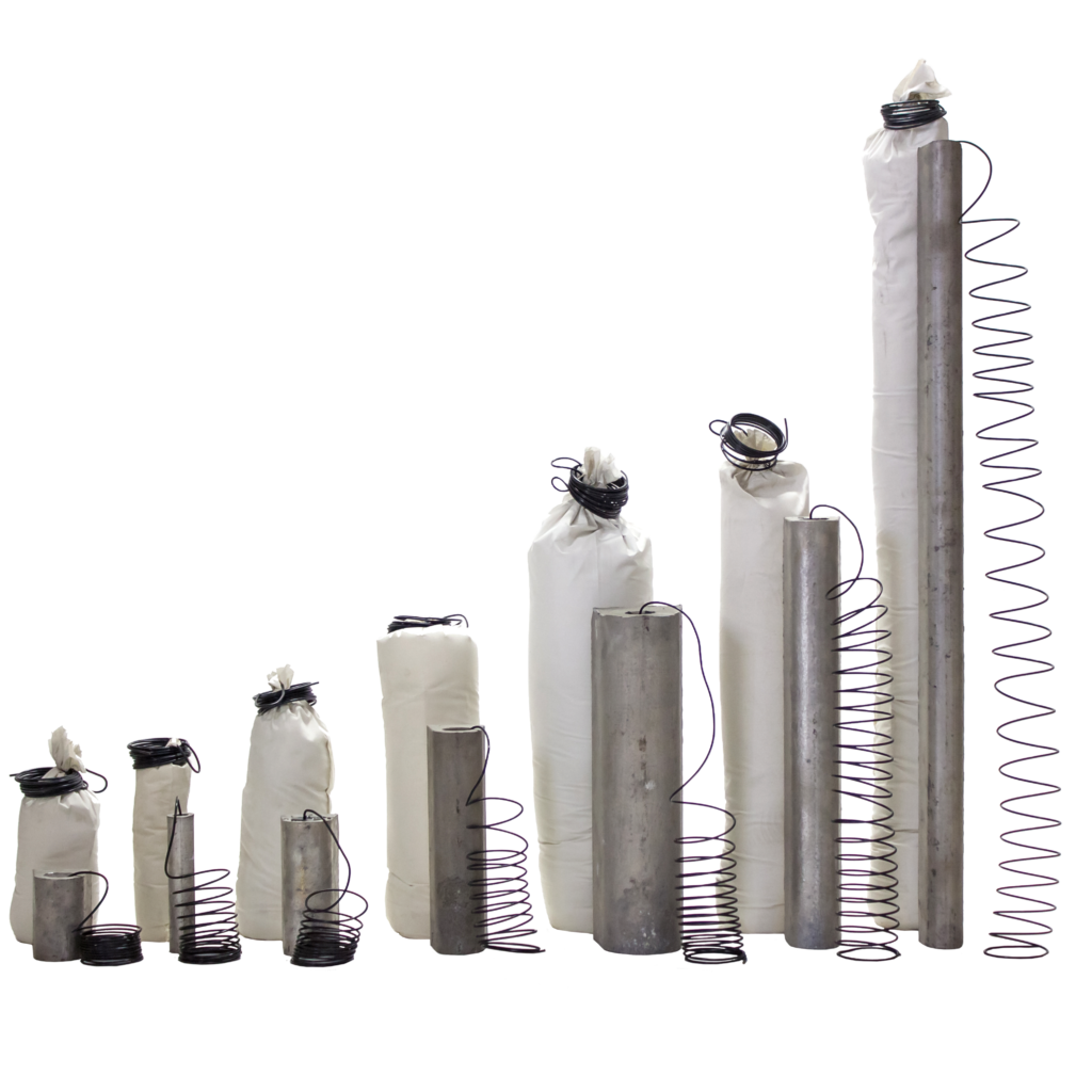 Several gray magnesium anodes of varying heights, some wrapped in white fabric with black wire.