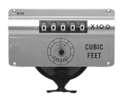 Silver industrial meter showing a cubic feet reading: 00000 x100, and a small dial reading 