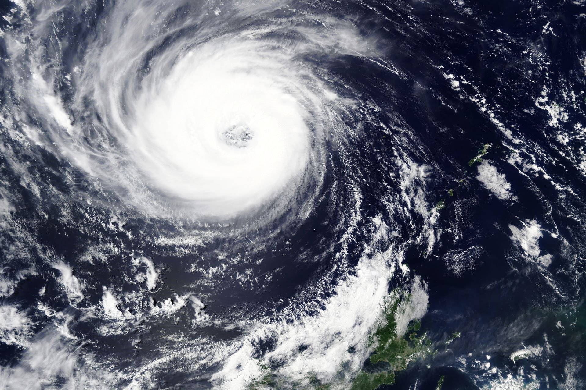 Satellite view of a hurricane over the ocean approaching the coast