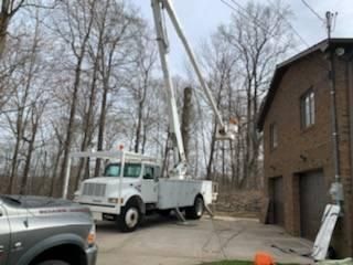A white truck with a crane — Pittsburgh, PA — Leitzell Tree Service LLC
