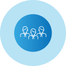 A group of people standing next to each other in a blue circle.