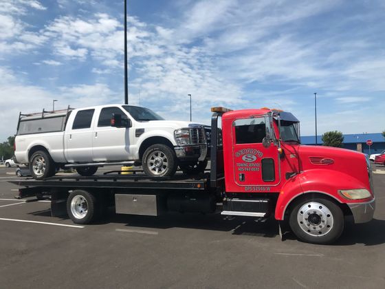 Towing A Black Van — Oklahoma City, OK — Sergio’s Towing Service