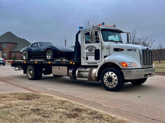 Tow Truck Inside Garage — Oklahoma City, OK — Sergio’s Towing Service Tow Truck Inside Garage — Oklahoma City, OK — Sergio’s Towing Service