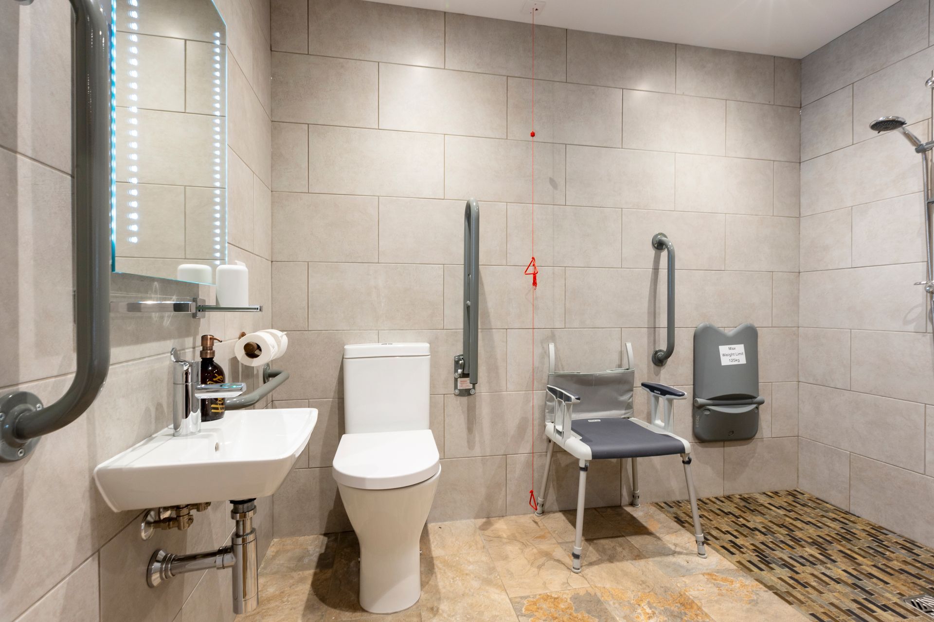 Ensuite wet-room with shower chair