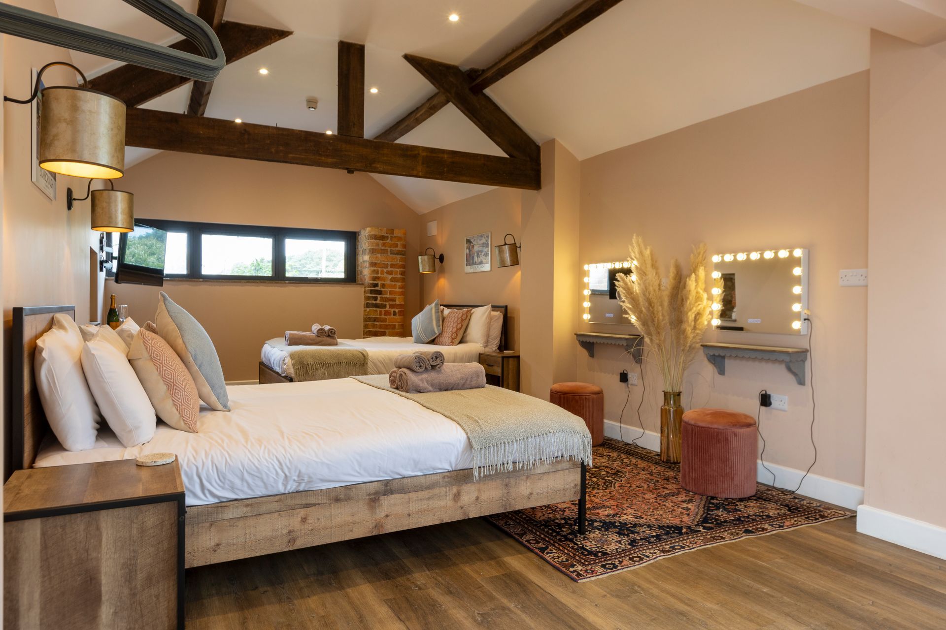 Large bedroom with two king beds