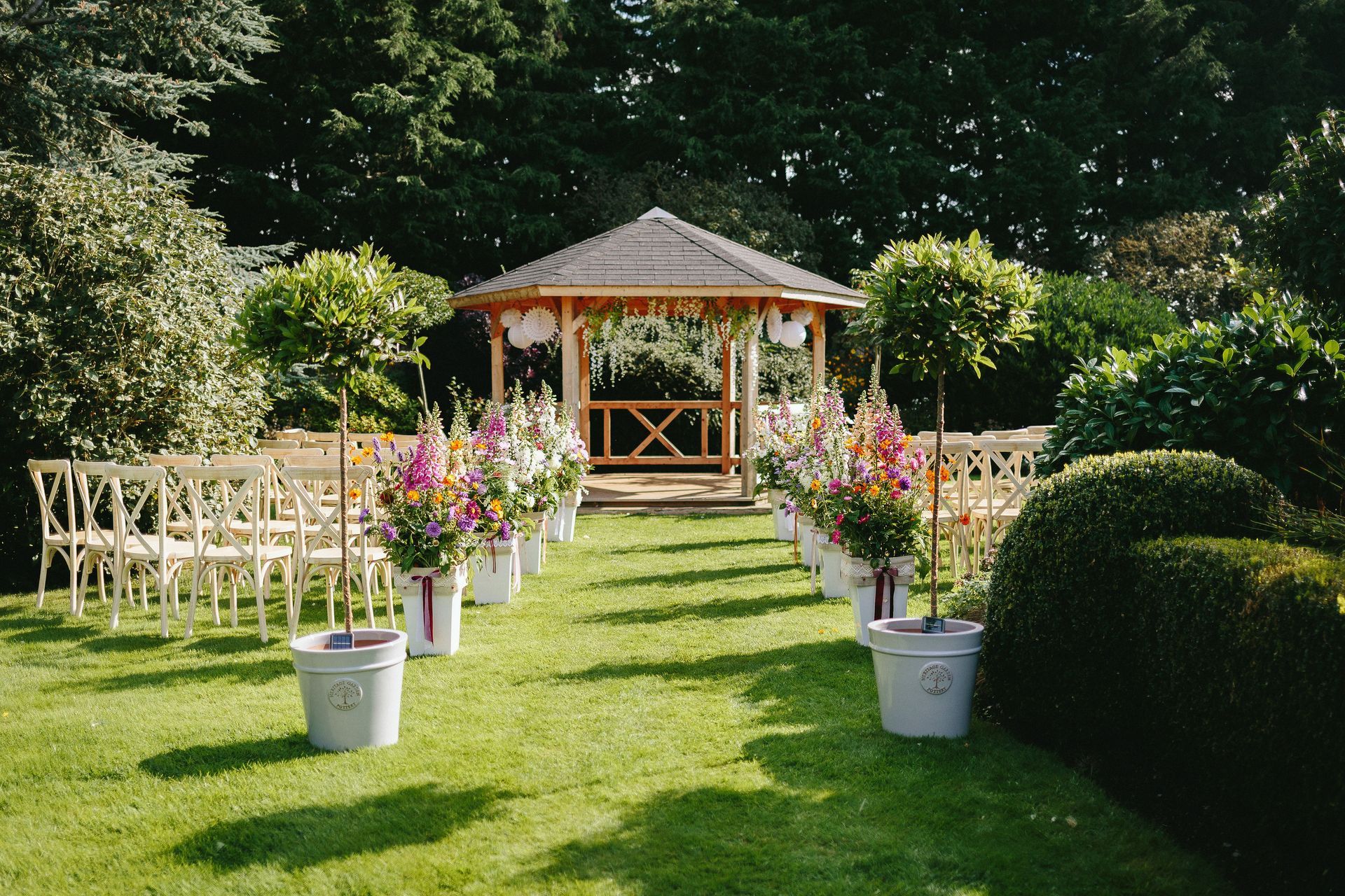 English country garden wedding ceremony gazebo at Westfield Farm Weddings
