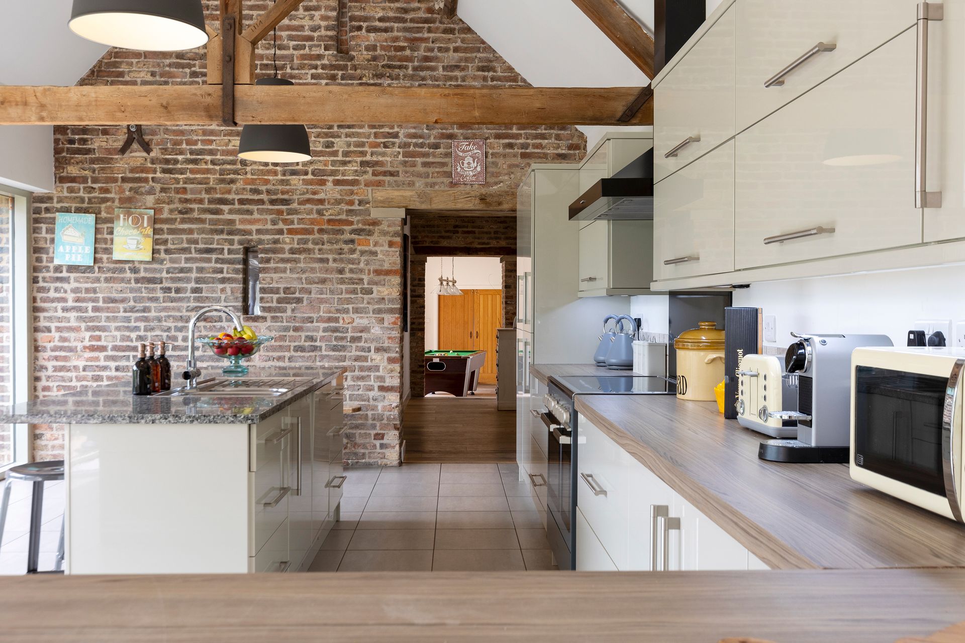 kitchen with brick wall
