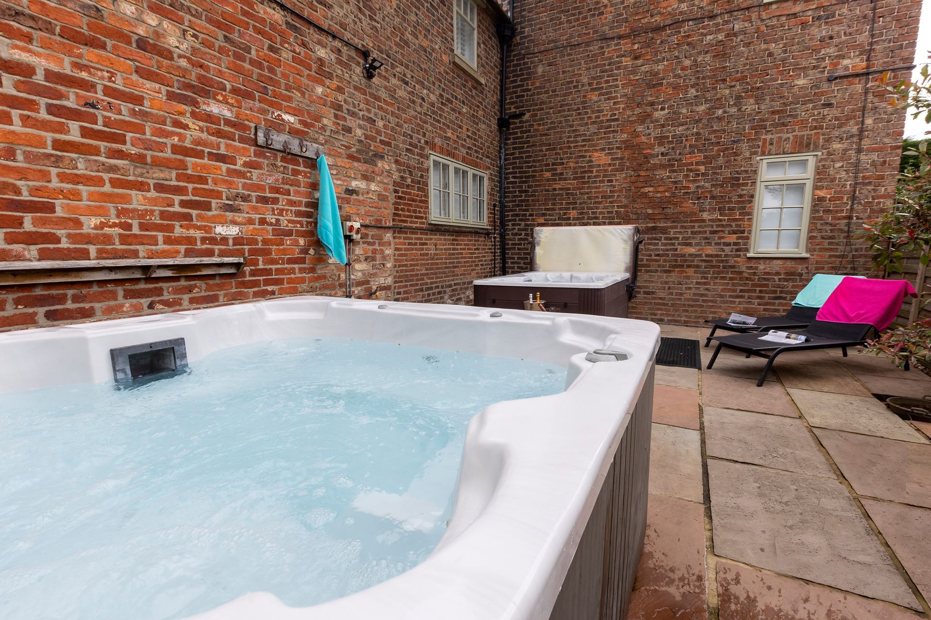 Two outdoor hot tubs