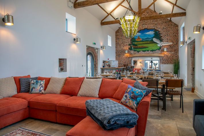 A living room filled with furniture and a coffee table.