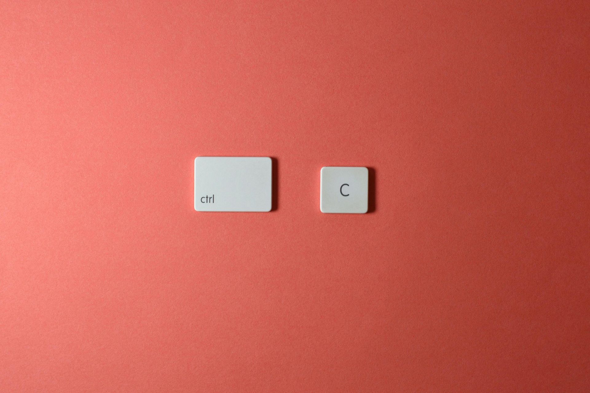 Two computer keyboard keys,
