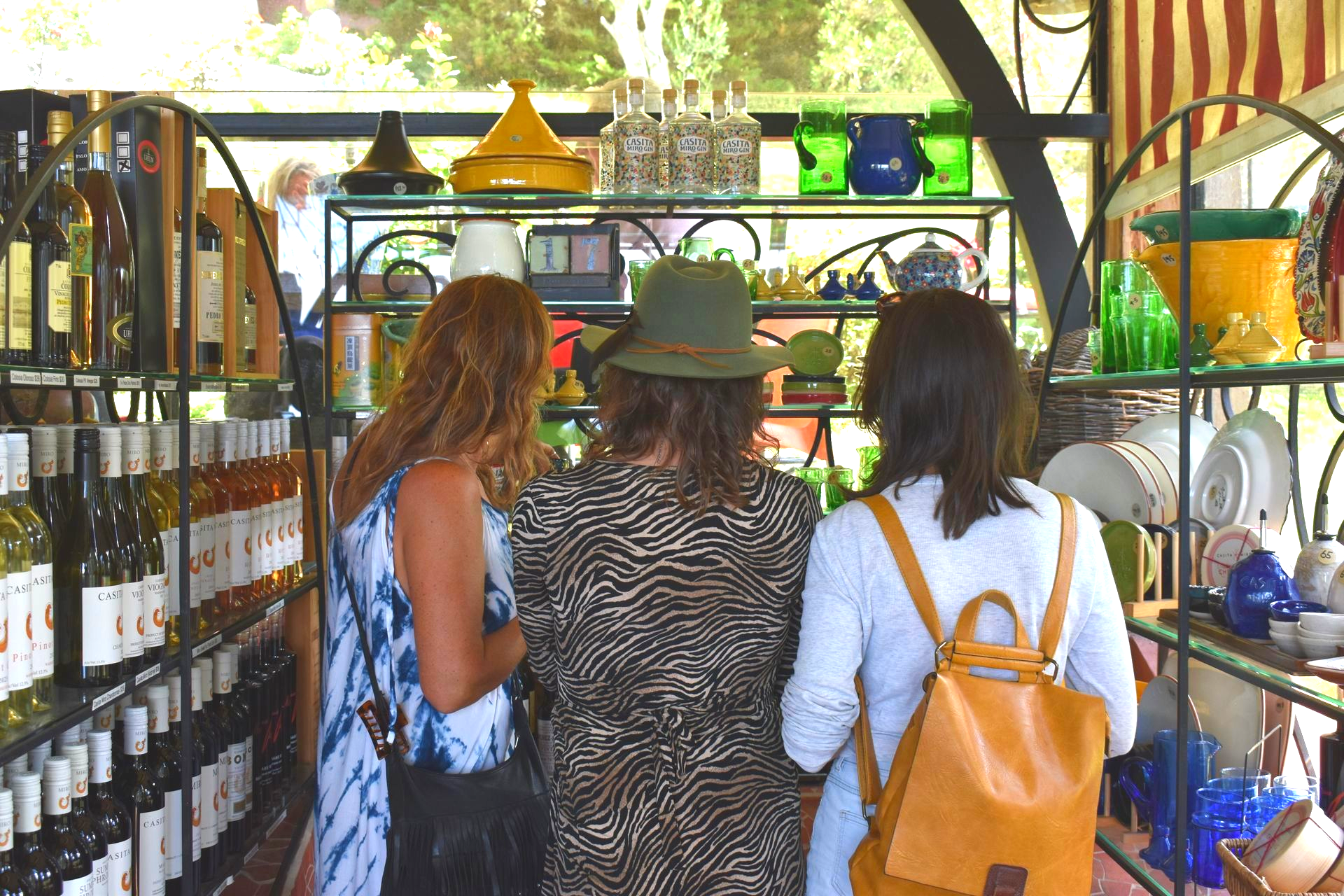 Three woman enjoying the gift shop at Casita Miro