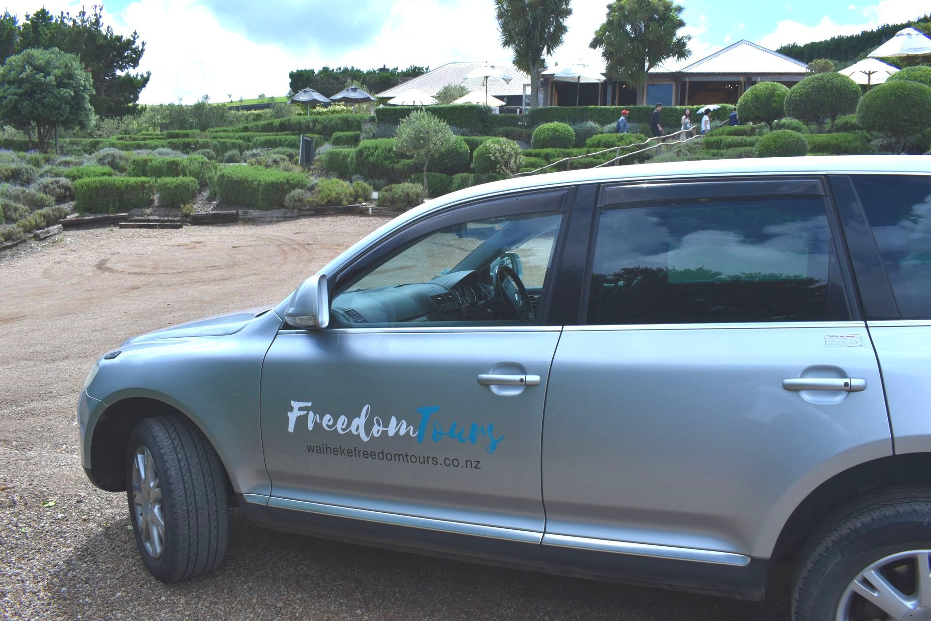 Waiheke Freedom Tours spacious tour vehicle at Mudbrick Vineyard.