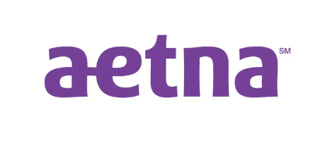 Aetna logo in purple lowercase text on a white background