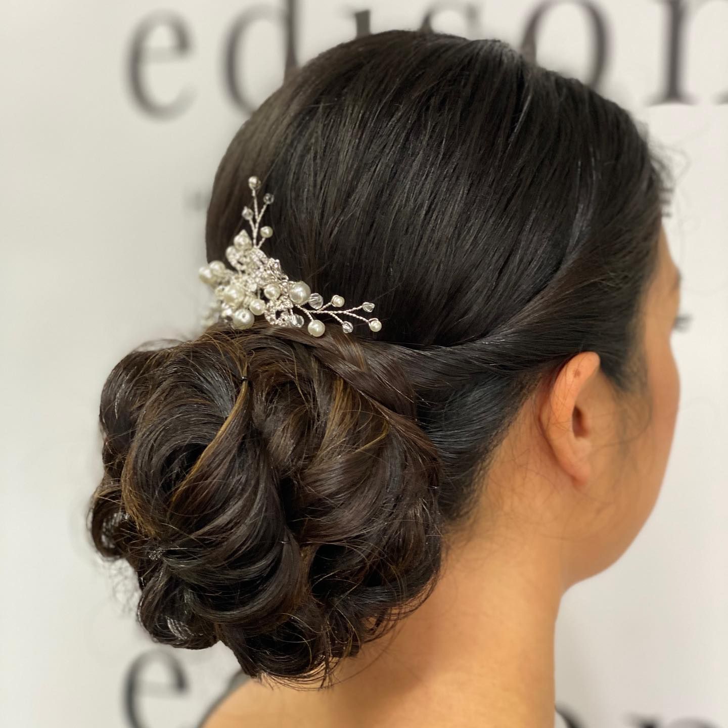 Woman's Hair Styled in An Updo with A Decorative Hair Piece — EDISON Hair Collective In Mackay, QLD