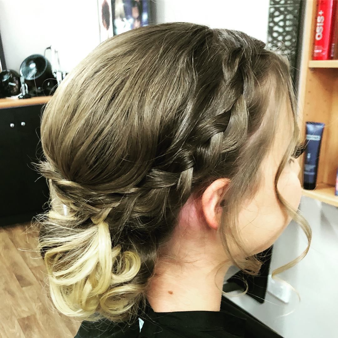 Woman with Blonde-Highlighted Hair in A Braided Updo — EDISON Hair Collective In Mackay, QLD