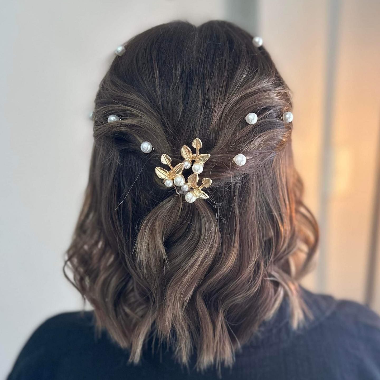 Woman With Brown Wavy Hair in a Half-up Style — EDISON Hair Collective In Mackay, QLD