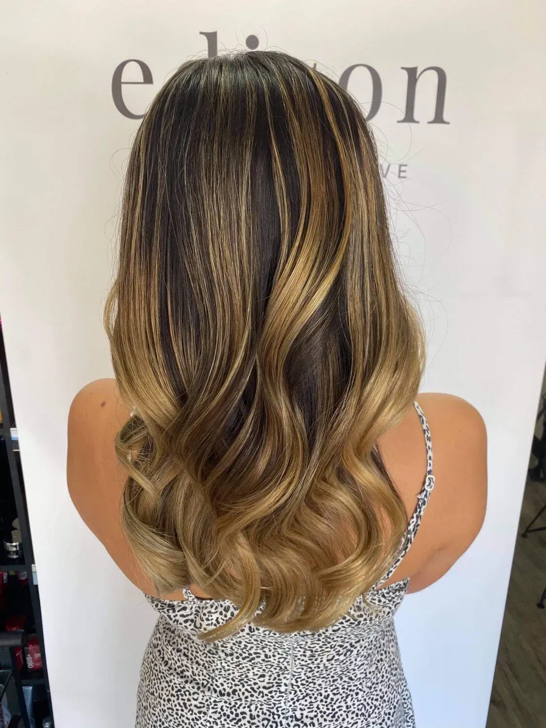 Woman with Long, Wavy Hair — EDISON Hair Collective In Mackay, QLD