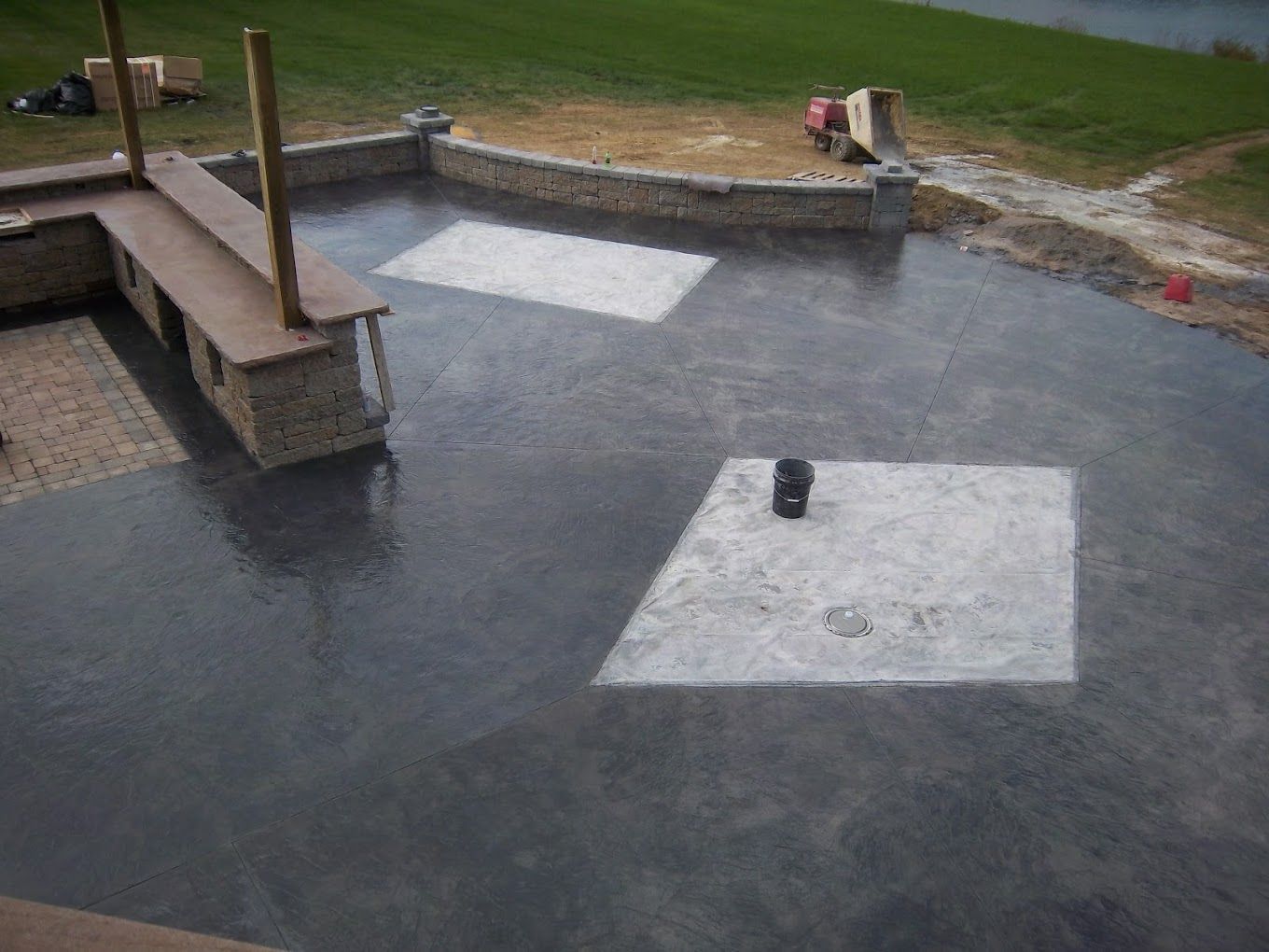 A concrete patio with a baseball diamond painted on it