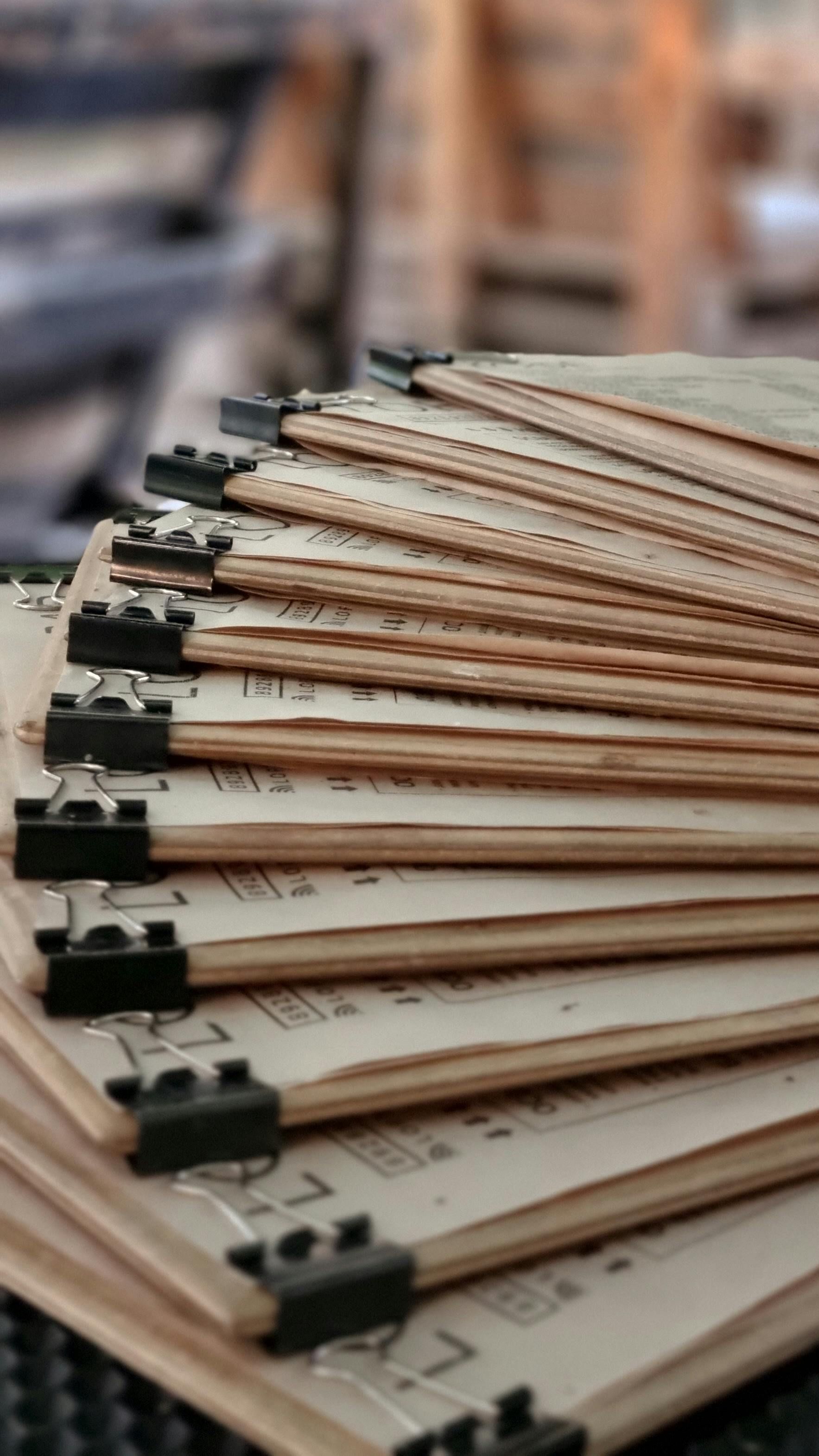 Folders with black clips
