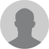 Silhouette d'avatar de profil générique grise sur fond circulaire gris clair