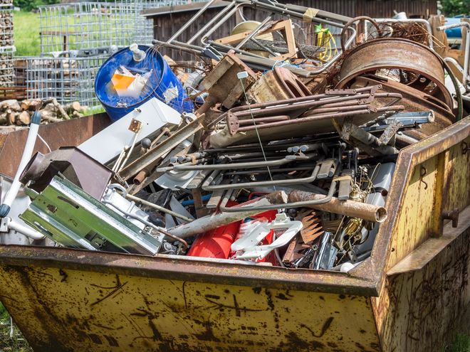 Blue Garbage Dumpster Full of Waste — Station, VA — C & S Disposal Blue Garbage Dumpster Full of Waste — Station, VA — C & S Disposal