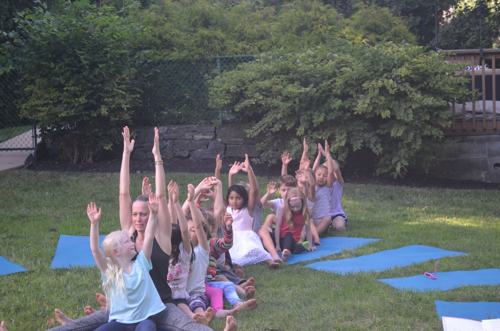 Children taking part in a Yoga@Play community event