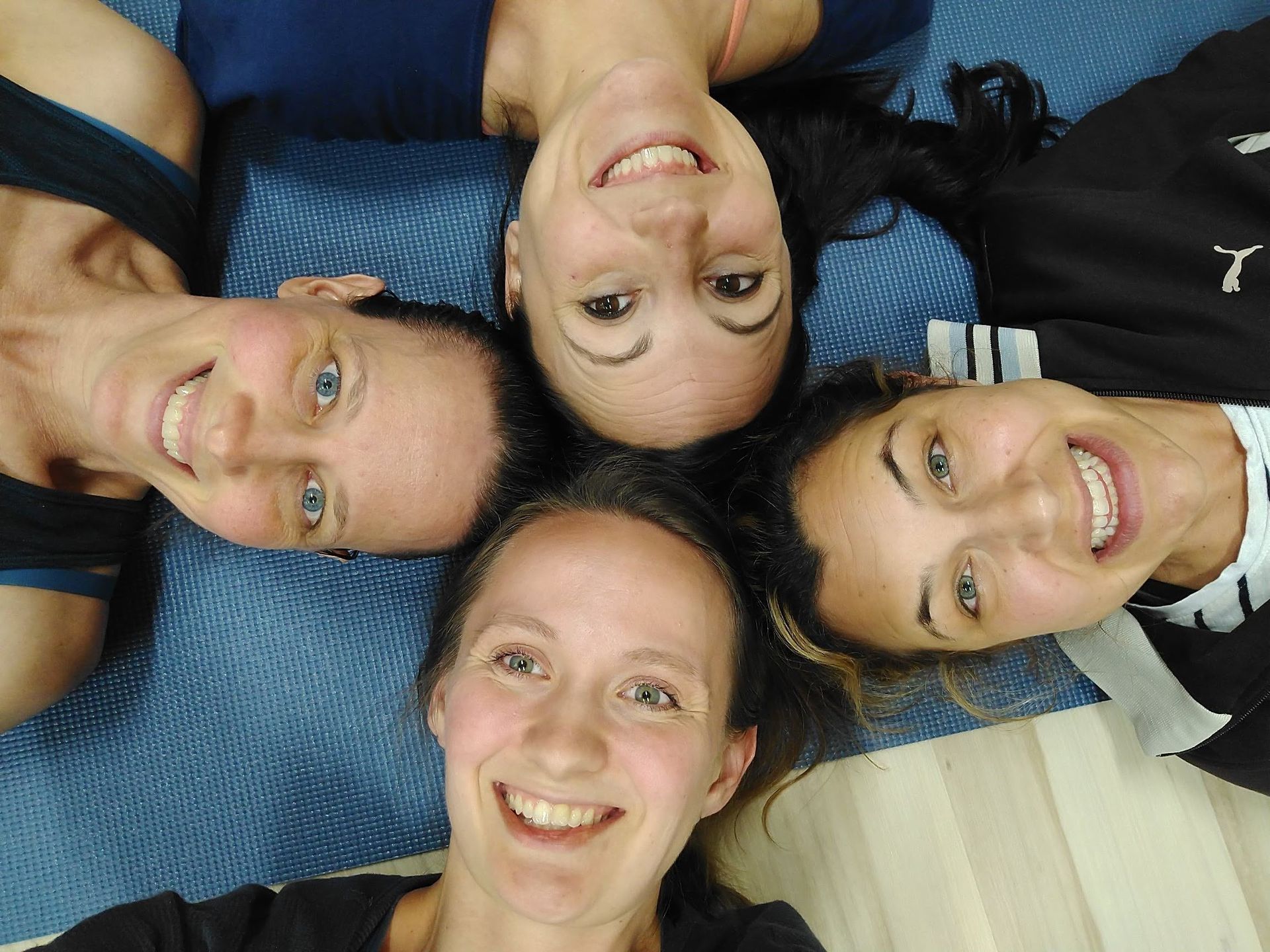 Trainees practicing during kids yoga teacher training