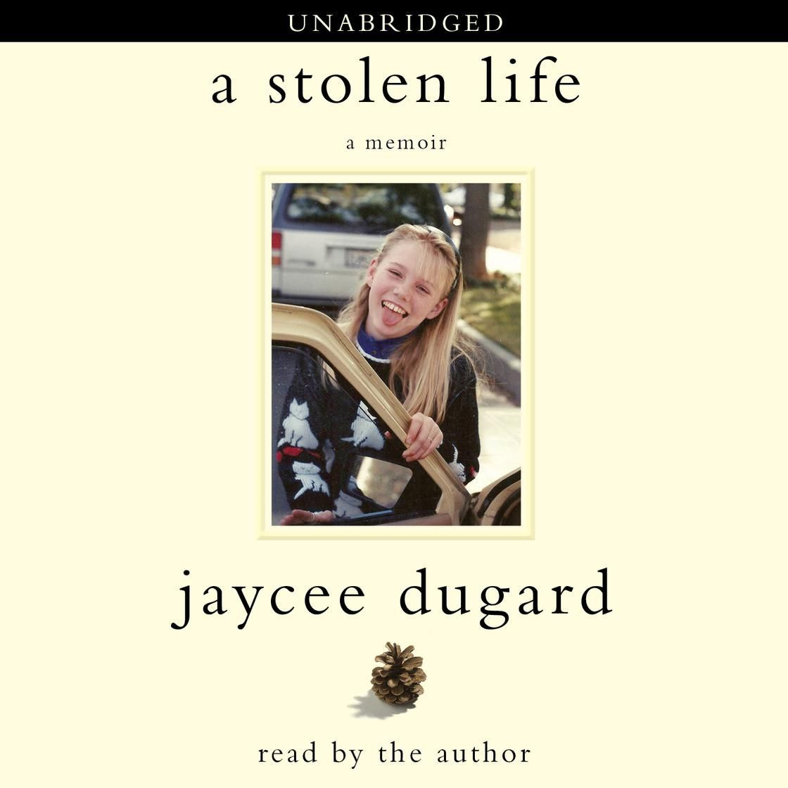 Book cover of “A Stolen Life” by Jaycee Dugard, with a smiling woman on a carousel horse.