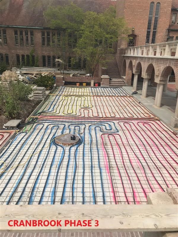 Piping laid out on a surface in multiple colors. 