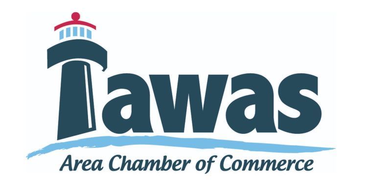 Logo for Tawas Area Chamber of Commerce, featuring a stylized lighthouse over the word