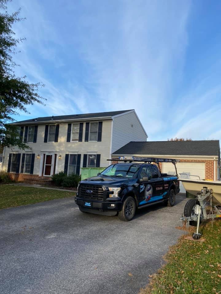 Shiloh Roofing Truck In Front Of Customers House — York, PA — Shiloh Roofing