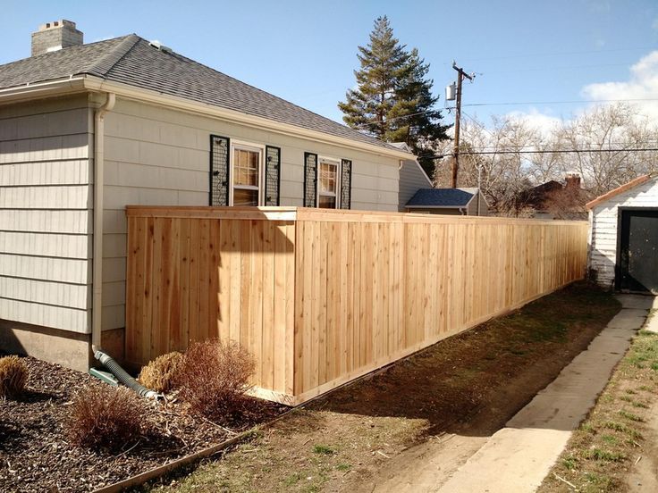 Wood fence cost per foot Houston Texas installed