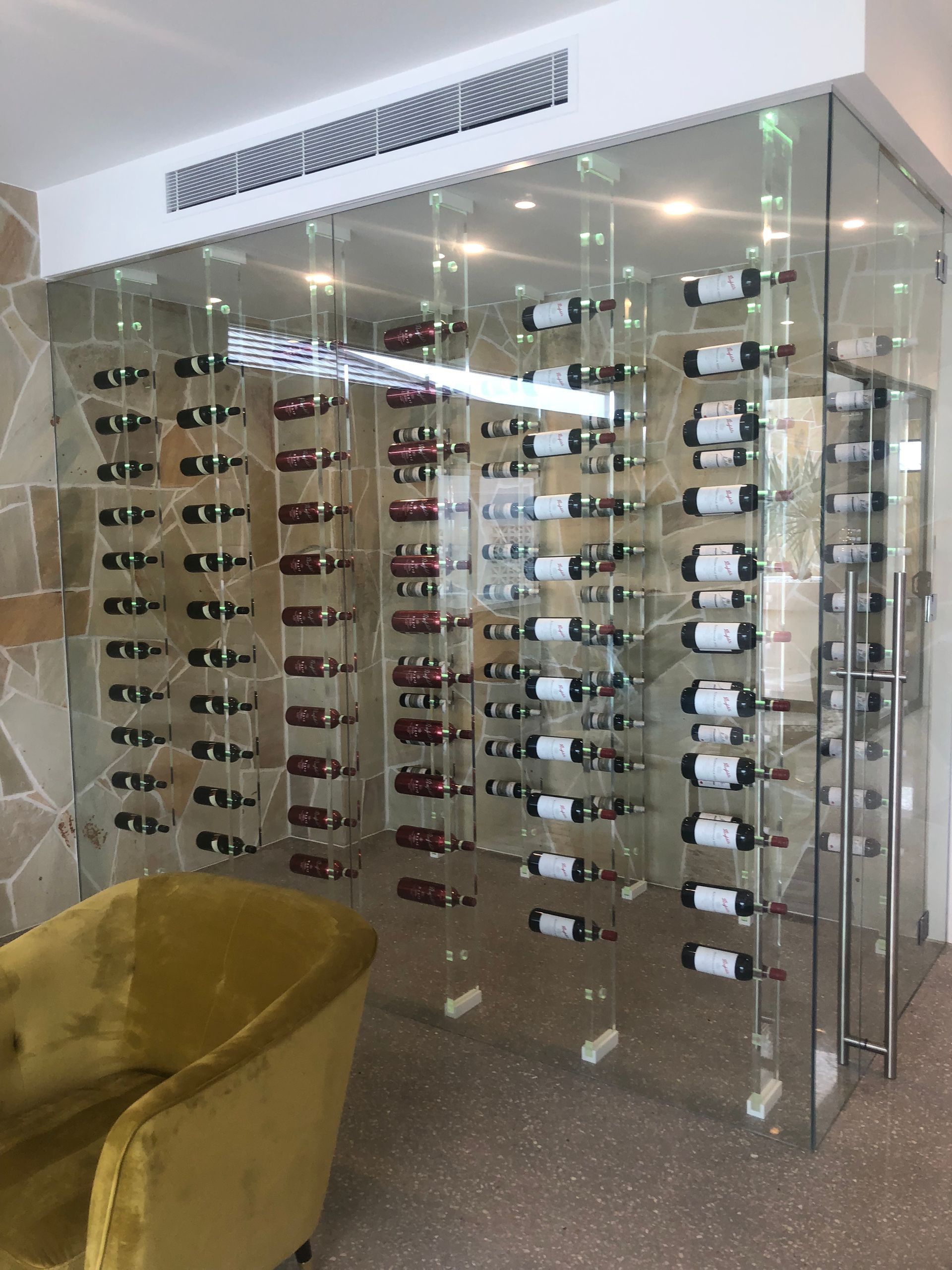 A wine cellar filled with lots of bottles of wine