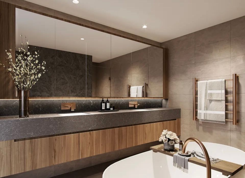 A bathroom with a bathtub , sink and mirror.