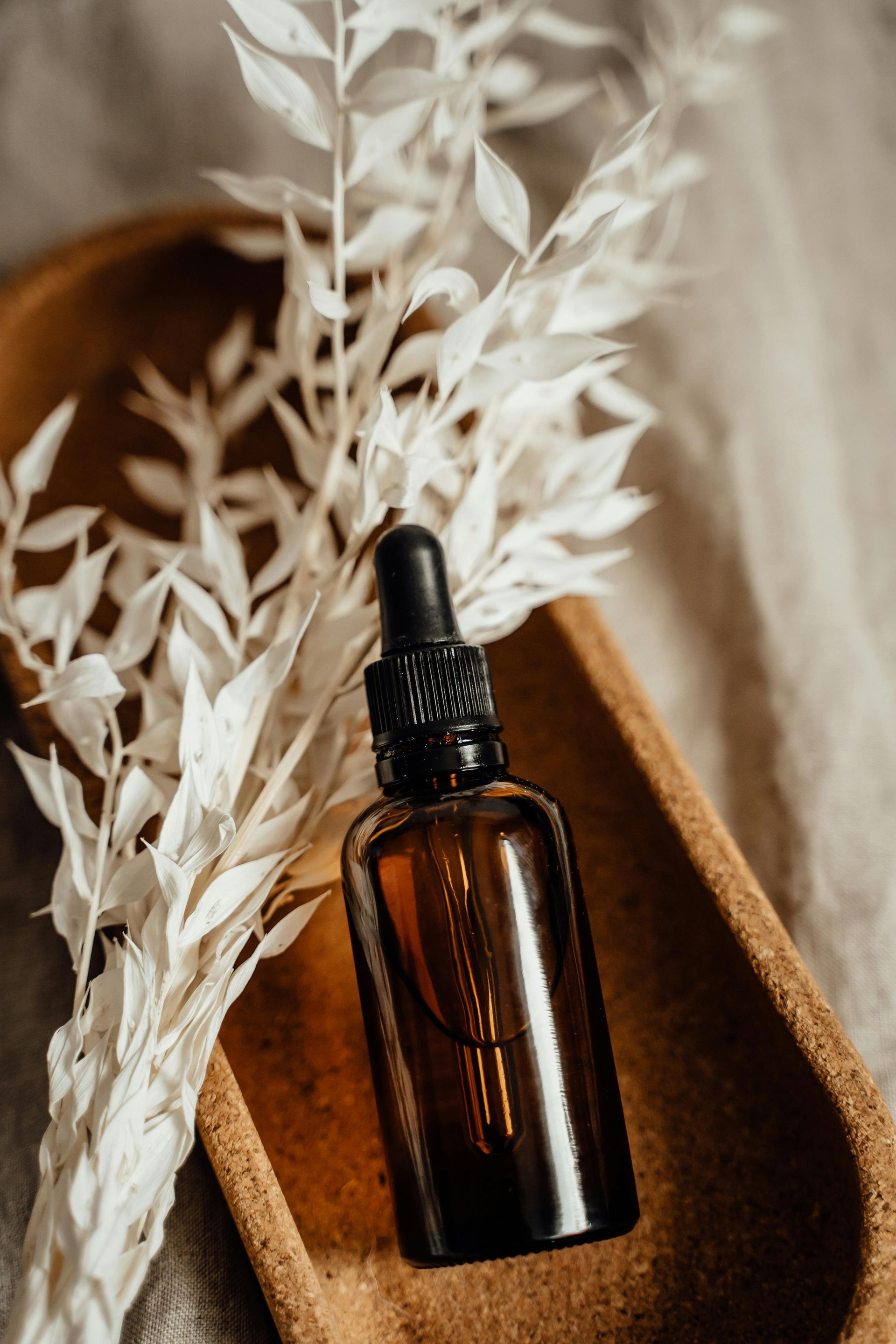 White Flowers, Mortar and Pestle, Small Bottles With Colourful Granules — All Body Holistic Health in Thuringowa Central, QLD