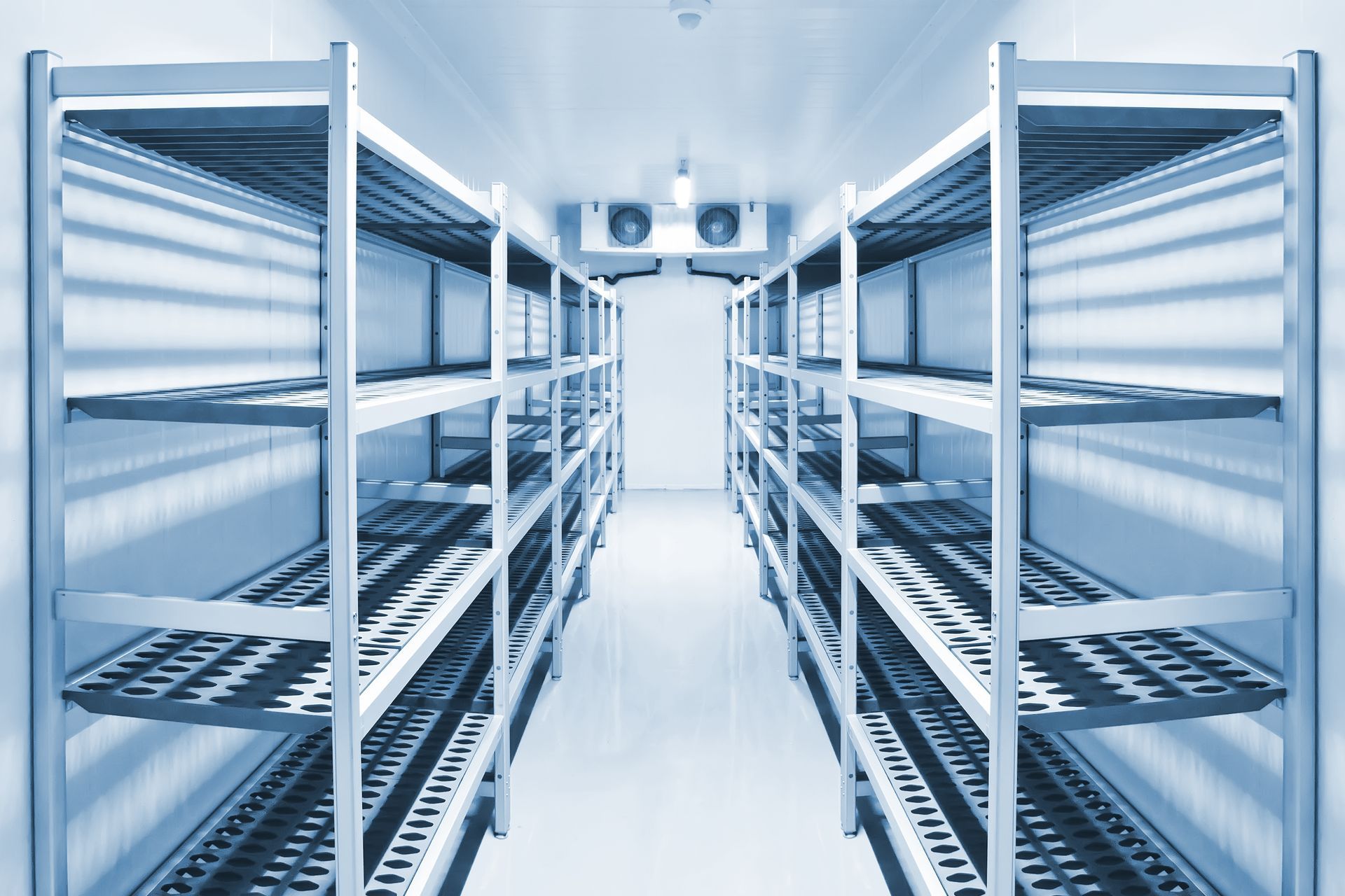A row of empty shelves in a warehouse.