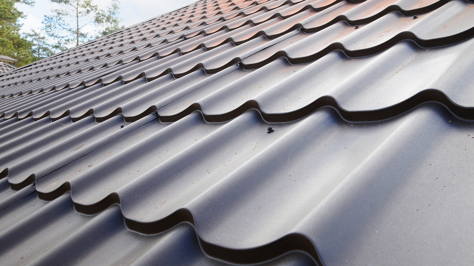 a close up of a roof with a lot of shingles on it .