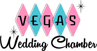 The logo for the vegas wedding chamber is pink and blue.