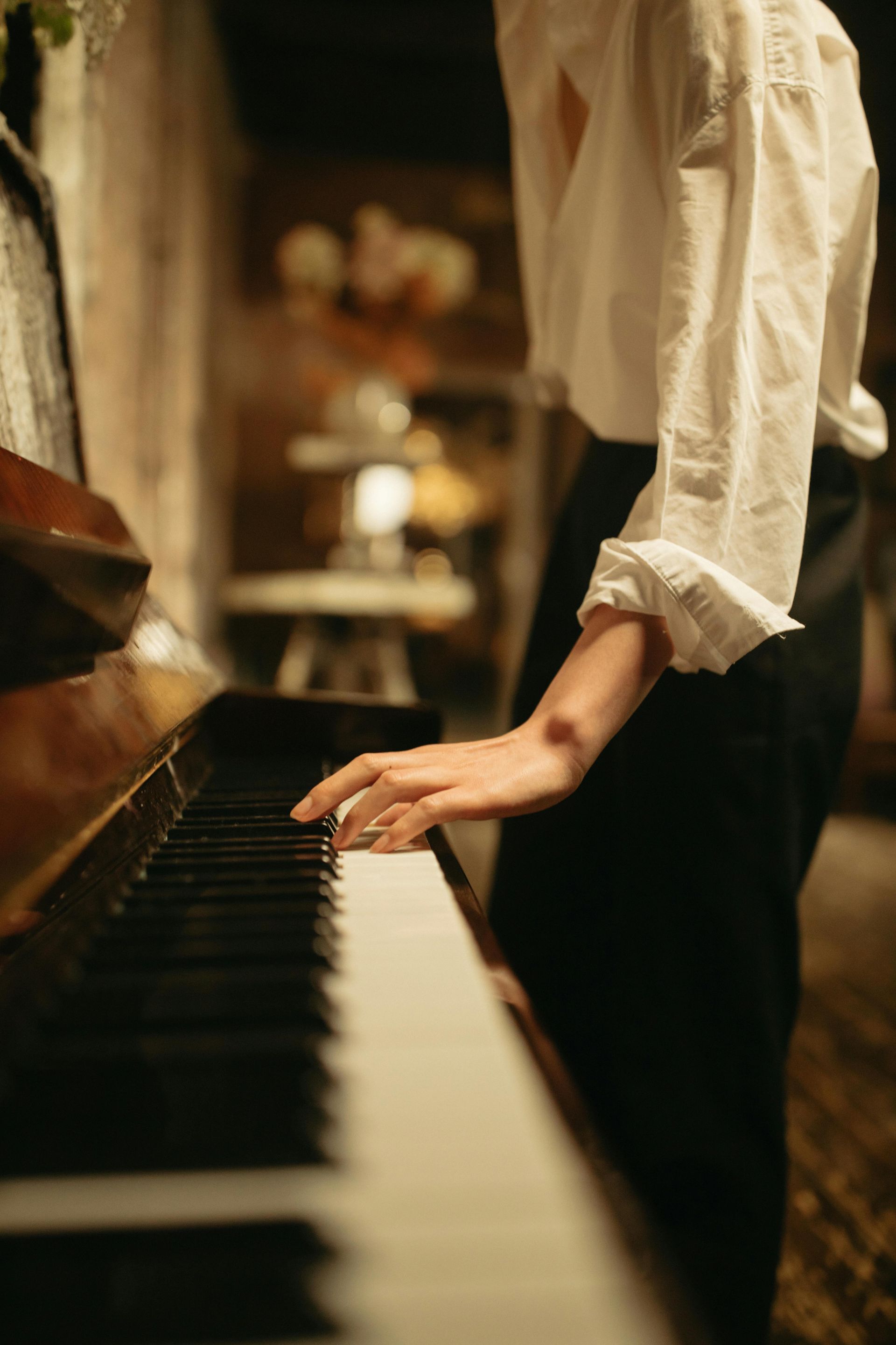 Piano Technician Adjusting Keys