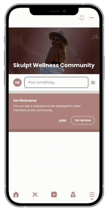 A cell phone with a skullt wellness community app on it.