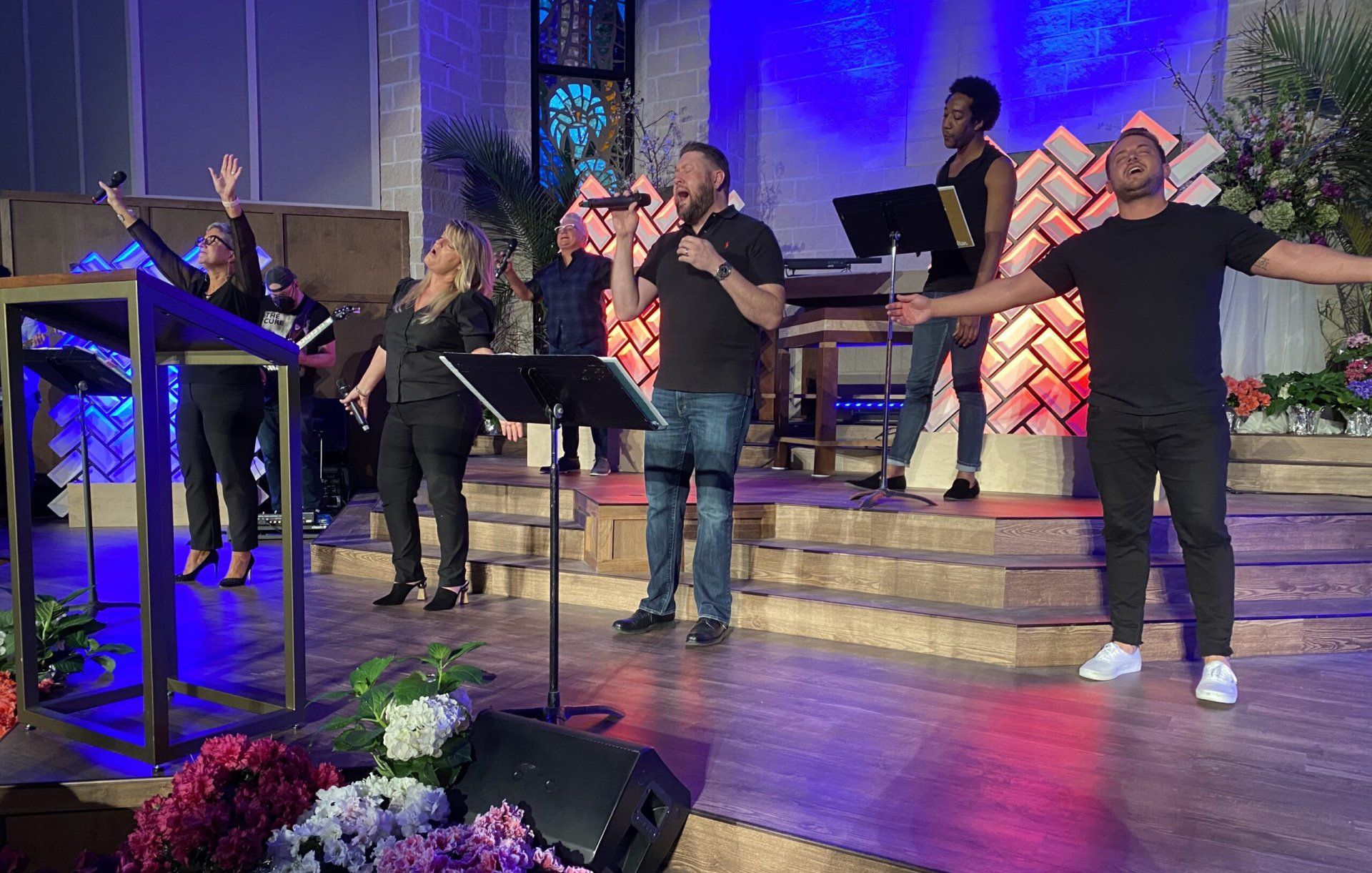 Photo of singers on the chancel performing a song