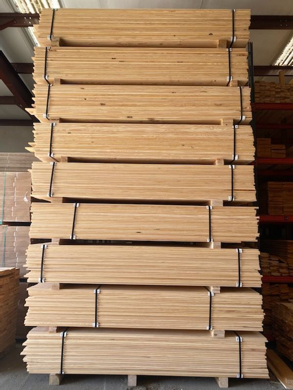 A stack of wooden boards sitting on top of each other