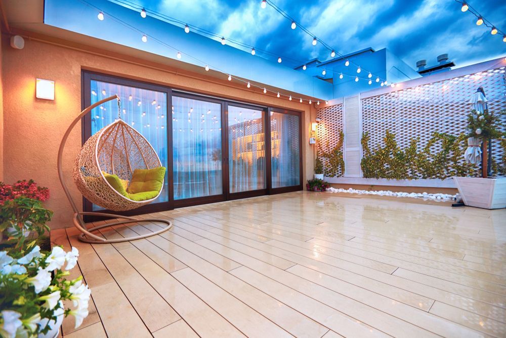 Rooftop Patio With Hanging Chair — JNR Building And Maintenance in Green Hill, QLD