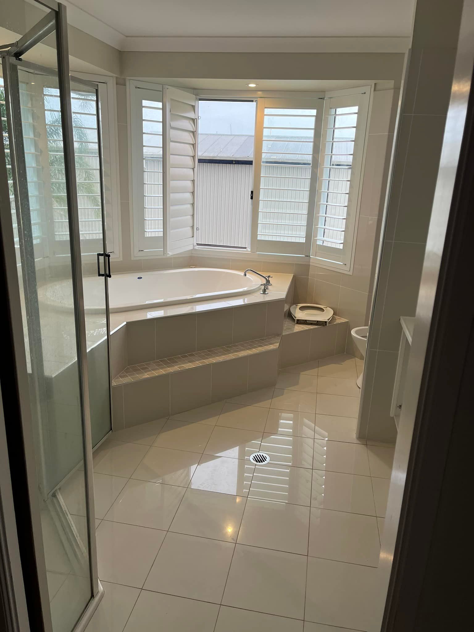 Bathroom With a Soaking Tub and Shower — JNR Building And Maintenance in Green Hill, QLD