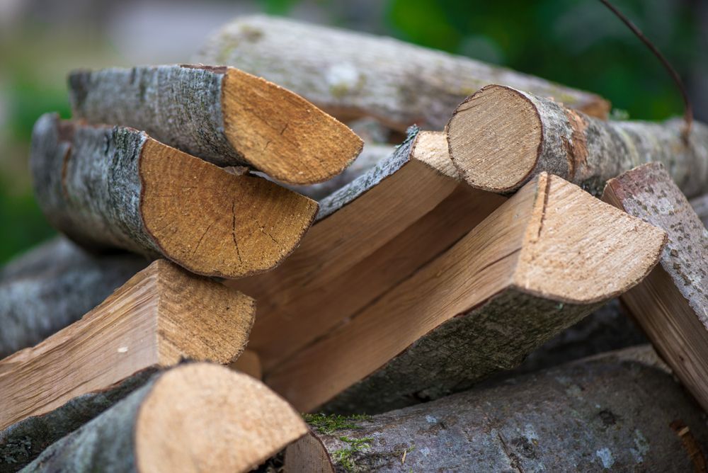 A Pile of Logs Stacked on Top of Each Other — Bundy Ice in Bundaberg East, QLD