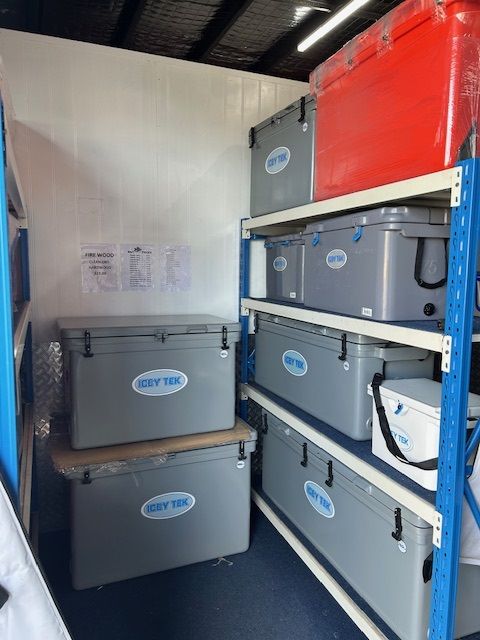 A Bunch of Coolers Are Stacked on Top of Each Other — Bundy Ice in Bundaberg East, QLD