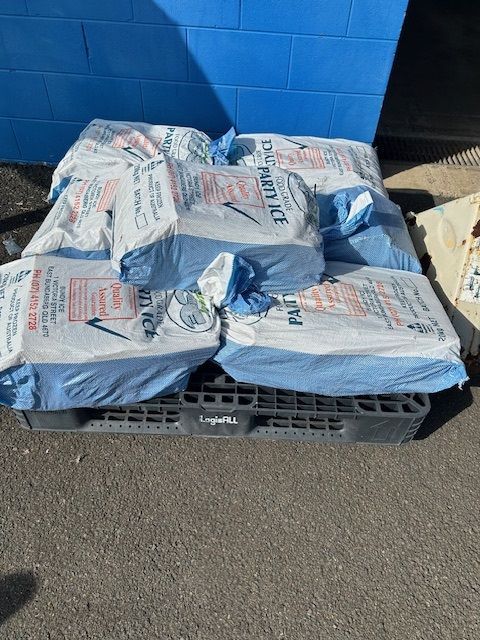 A Pile of Bags Sitting on Top of a Pallet — Bundy Ice in Bundaberg East, QLD