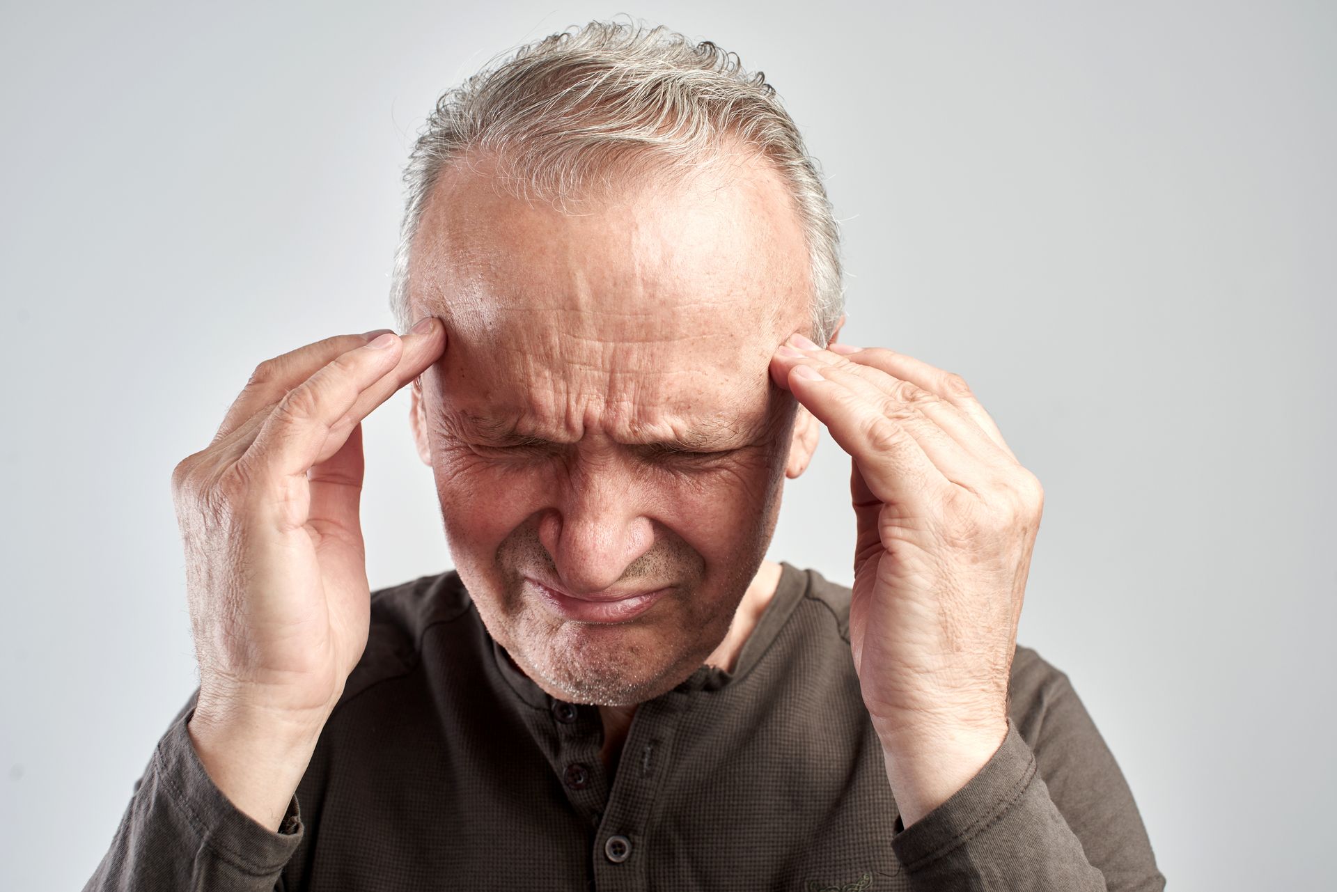 a man with a severe headache